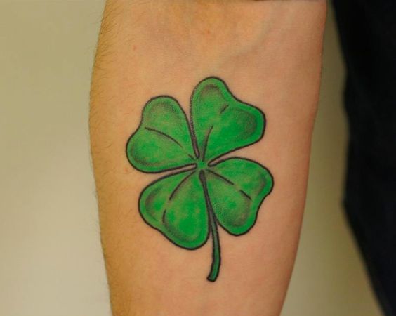 Classy green clover tattoo