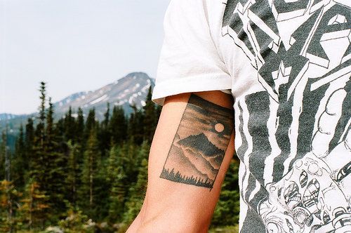 Gradient mountains tattoo