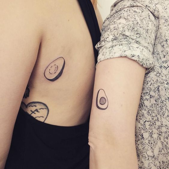Matching avocado tattoos for best friends