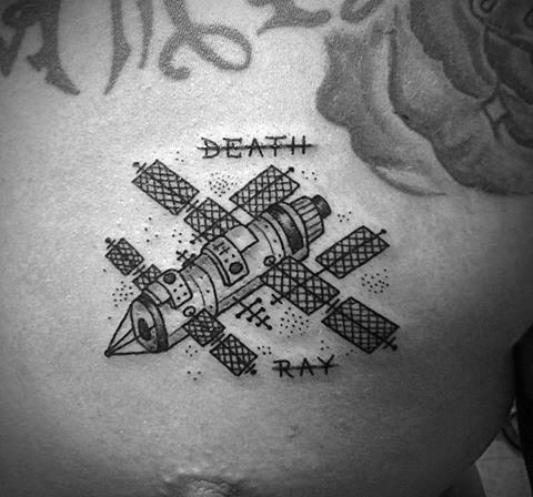 Probe tattoo on the chest