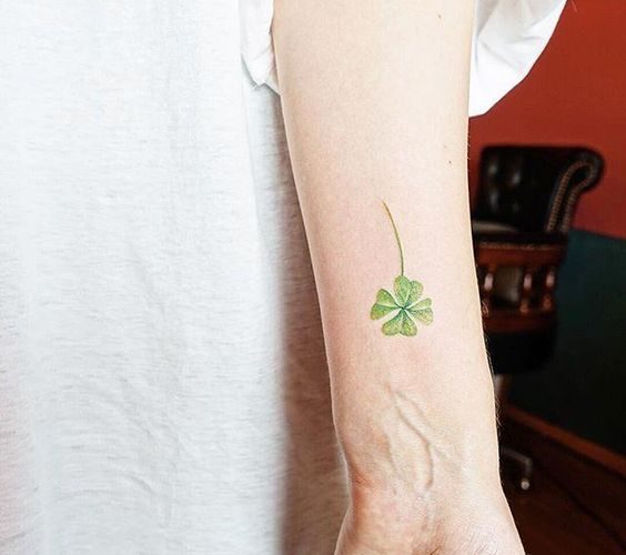 Superb four leaf clover tattoo on the inner wrist