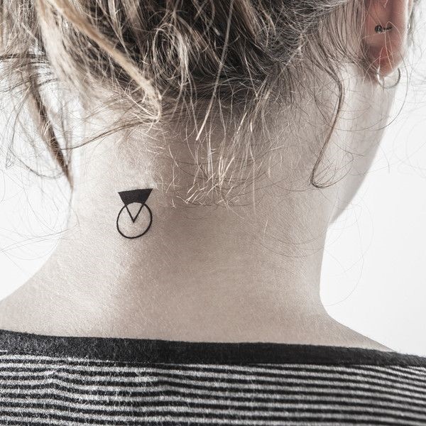 Triangle and circle tattoo on the back of the neck