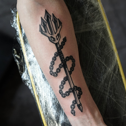 Trident and chain tattoo by philip yarnell