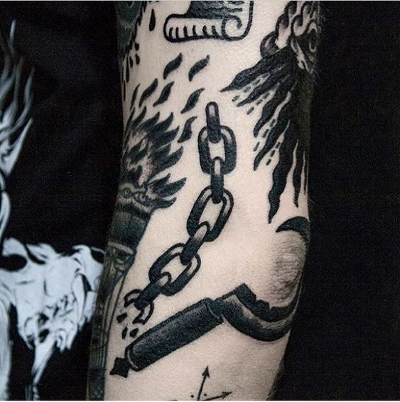 Blackwork chain tattoo