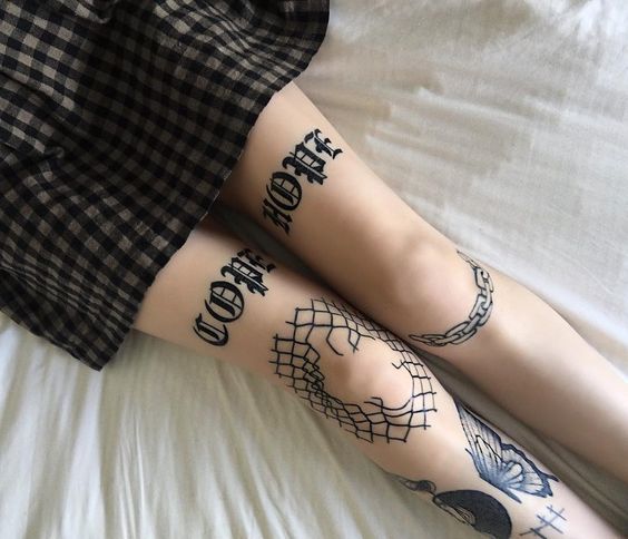 Chain tattoo below the left knee