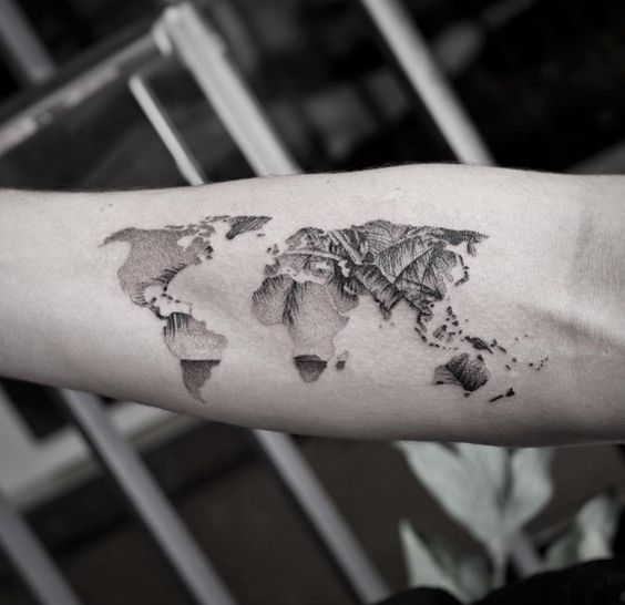Double exposure world map and tropical island landscape tattoo