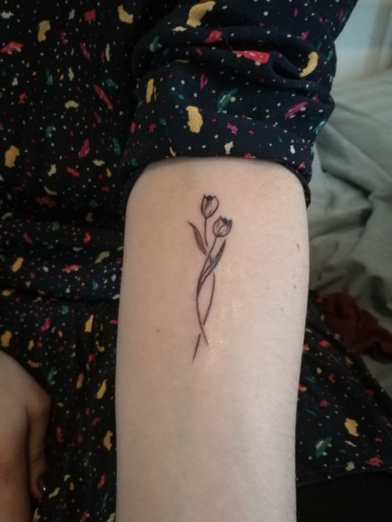 Two small tulips tattoo