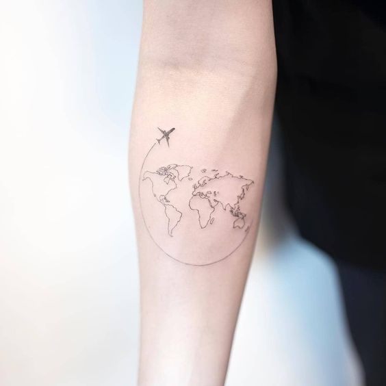 World map and small airplane tattoo