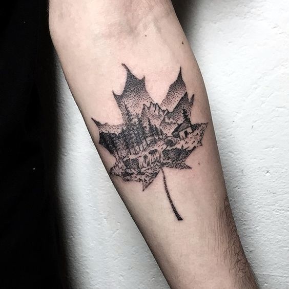 Dot work maple leaf with a landscape of a forest and mountain