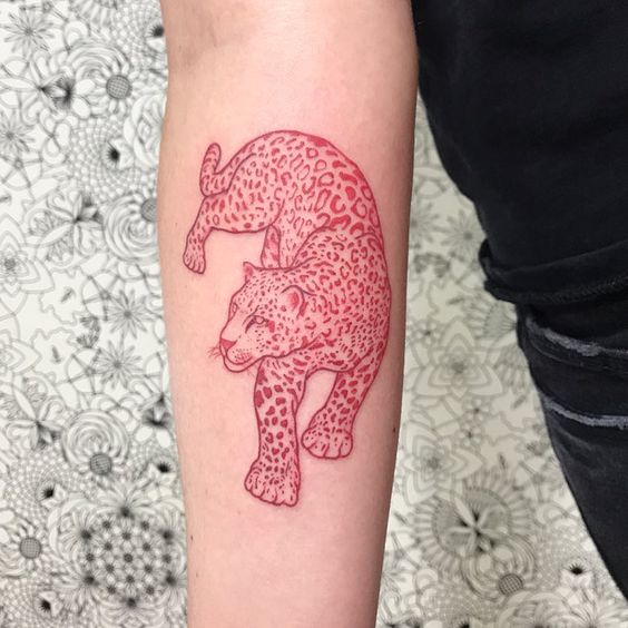 Red leopard tattoo