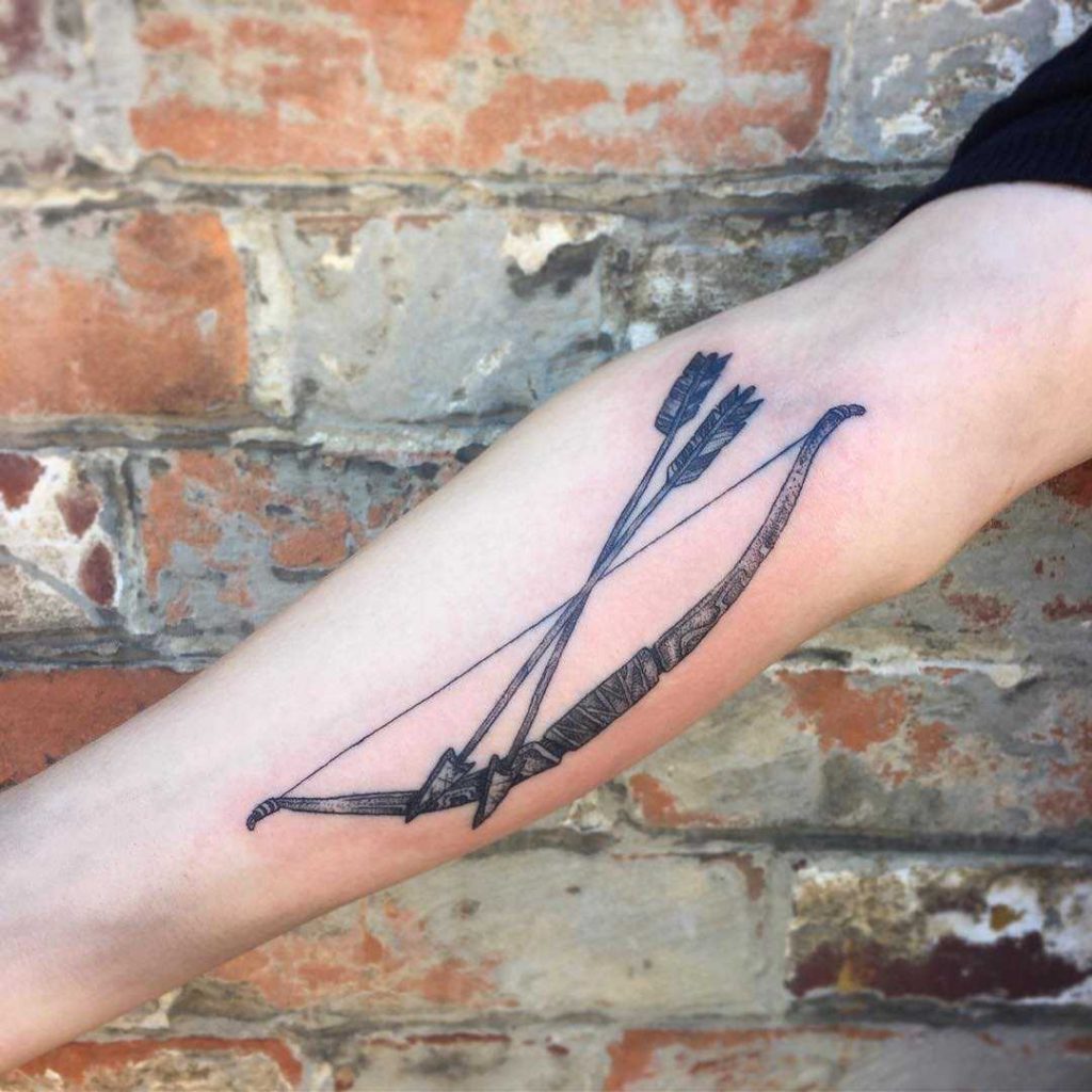 Bow and two arrows tattoo by Esme Lynch