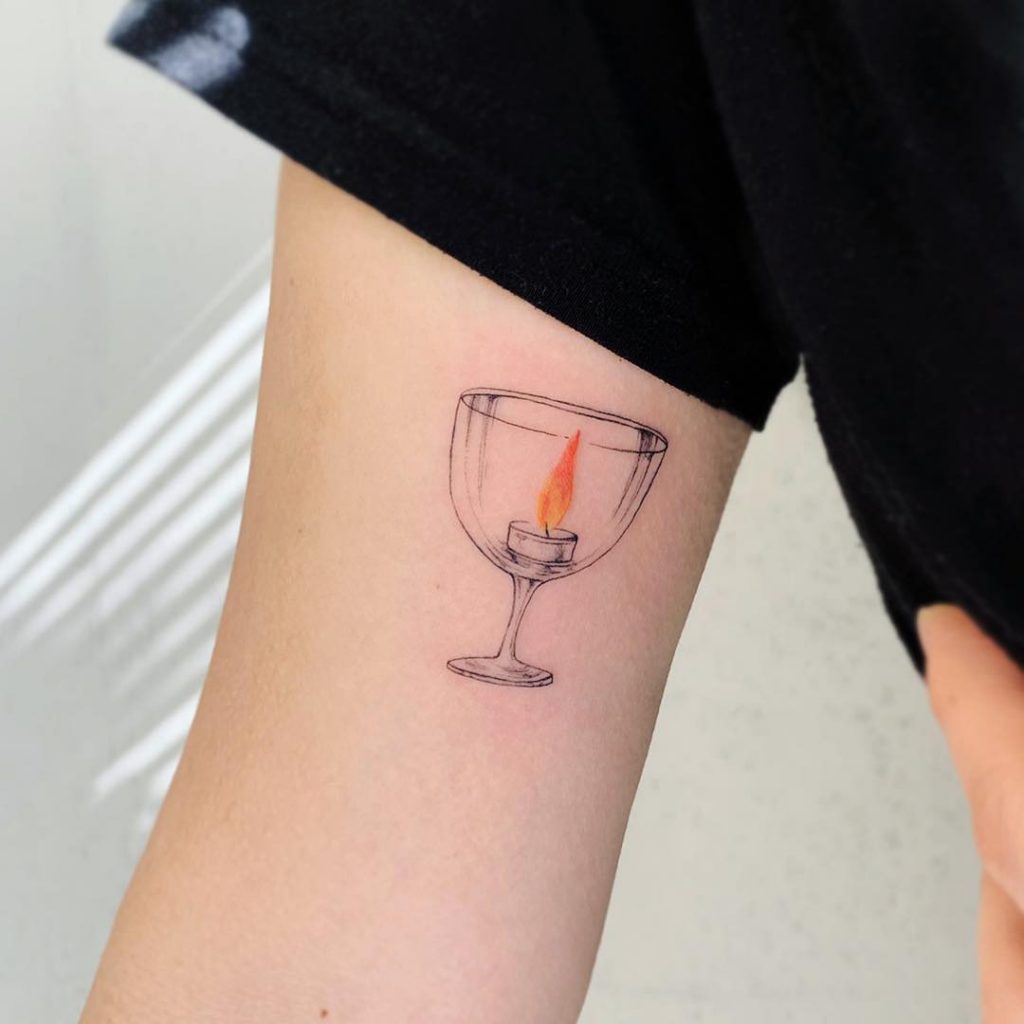 Candle in a glass tattoo by Onul