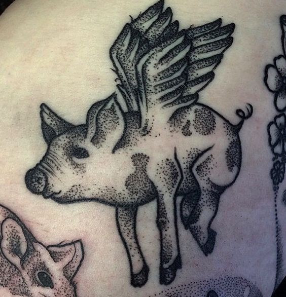 Dot work flying pig tattoo