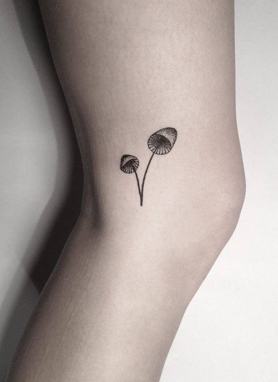 Hand-poked mushroom tattoo by Lara M. J