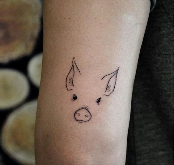 Pig on the back of the arm