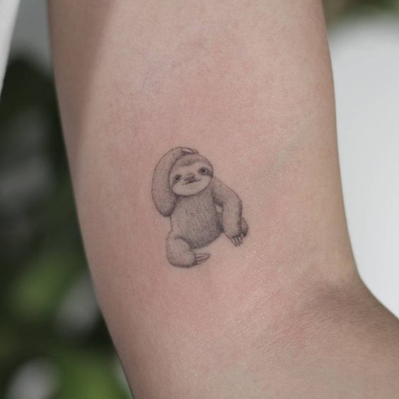 Single needle sloth tattoo