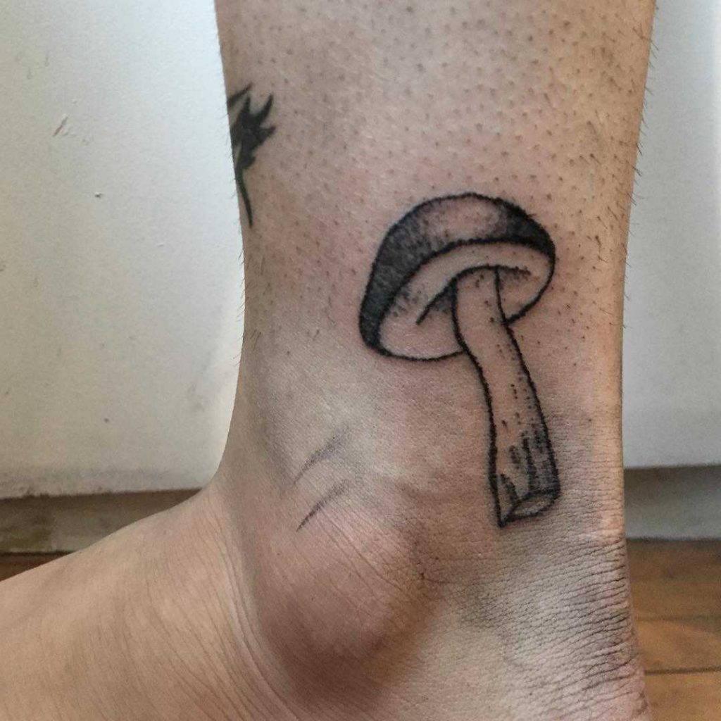Small mushroom tattoo on the ankle