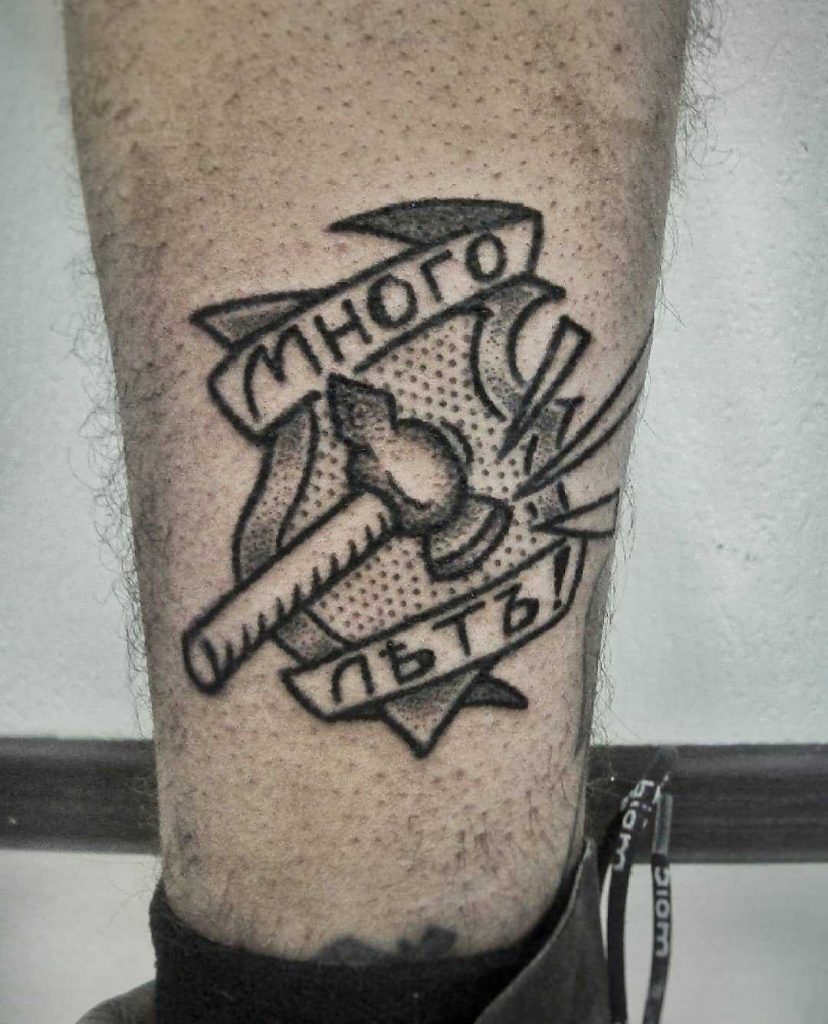 Stick and poke shield tattoo by Иван Сабакин