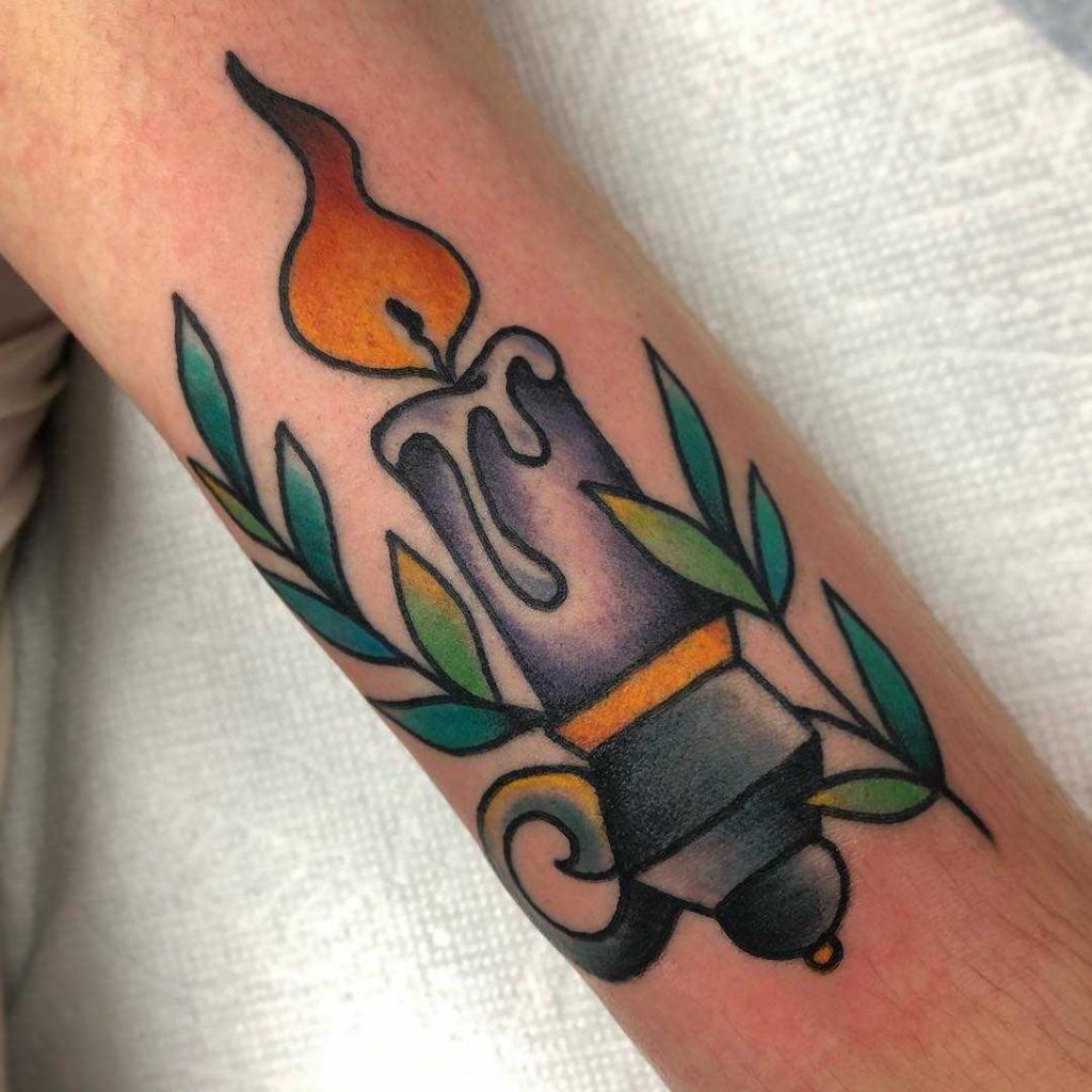 Traditional candle tattoo by Monika Vanasse