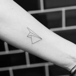 Paper airplane tattoo – the symbol of freedom and childhood