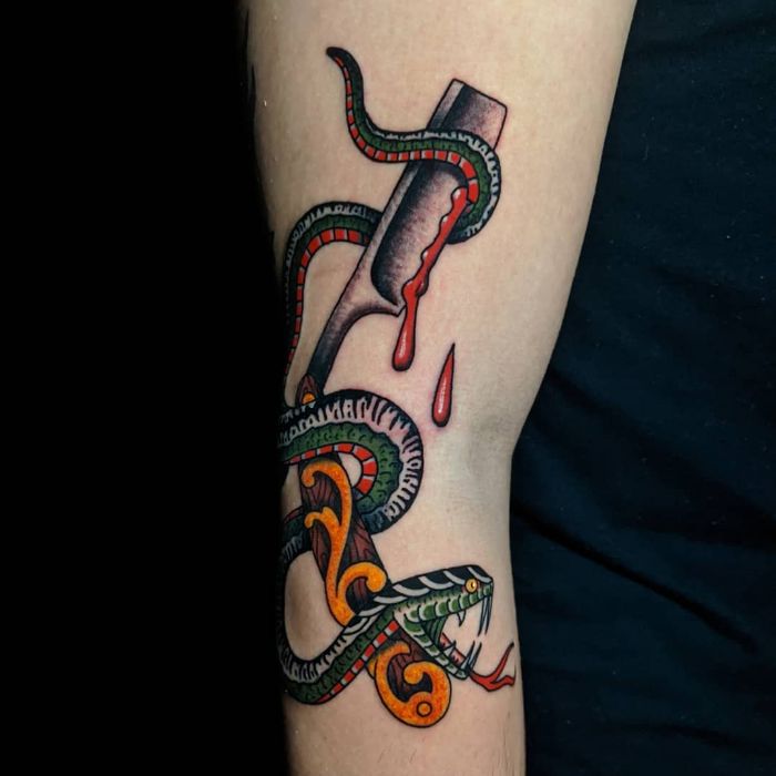 Snake and straight razor inked by @looming moon