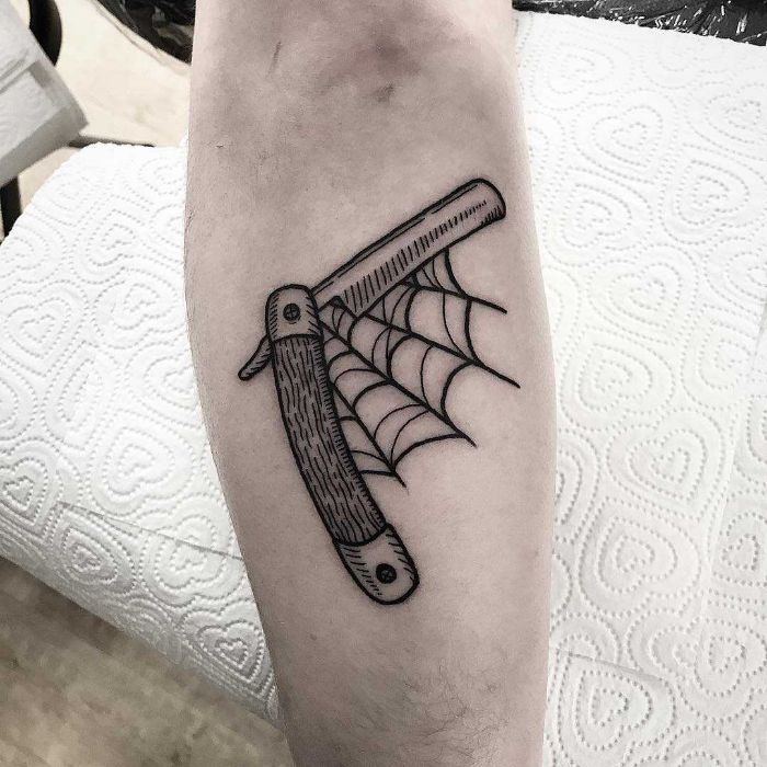 Woodcut straight razor tattoo by @deborahpowtattoos