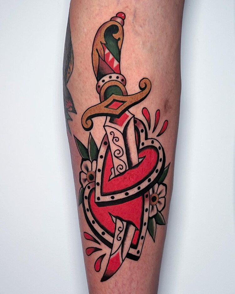 Dagger and Heart Tattoo: Meaning, Origins, and 50 Beautiful Ideas