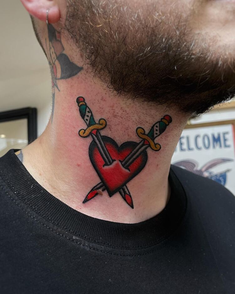 Heart And Dagger Neck Tattoo by @chrisdevinetattoo