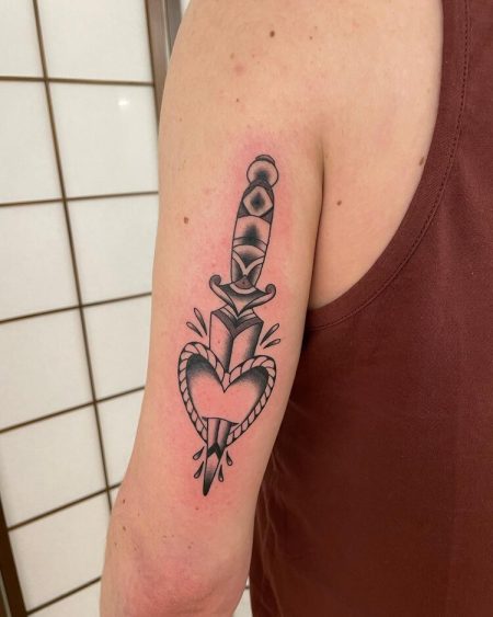 Dagger and Heart Tattoo: Meaning, Origins, and 50 Beautiful Ideas