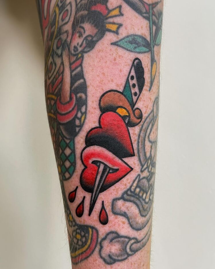 Small Dagger And Heart Tattoo by @chrisdevinetattoo