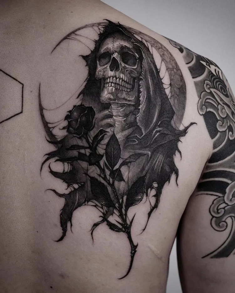 Black skull tattoo by @gara tattooer